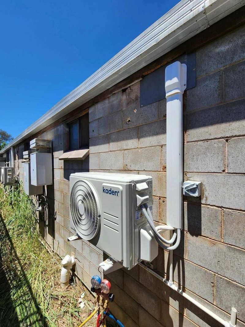 Multiple supplies and isolators run along a commercial wall